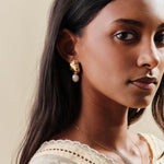 Gold shell earrings with hanging freshwater pearls