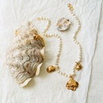 Pearl and gold shell pendant necklace