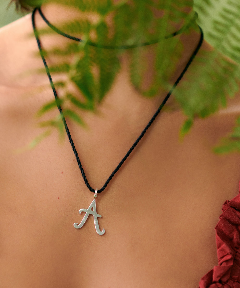 kitty-joyas-hammered-letter-pendant-pure-silk-cord