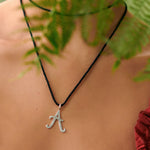 kitty-joyas-hammered-letter-pendant-pure-silk-cord