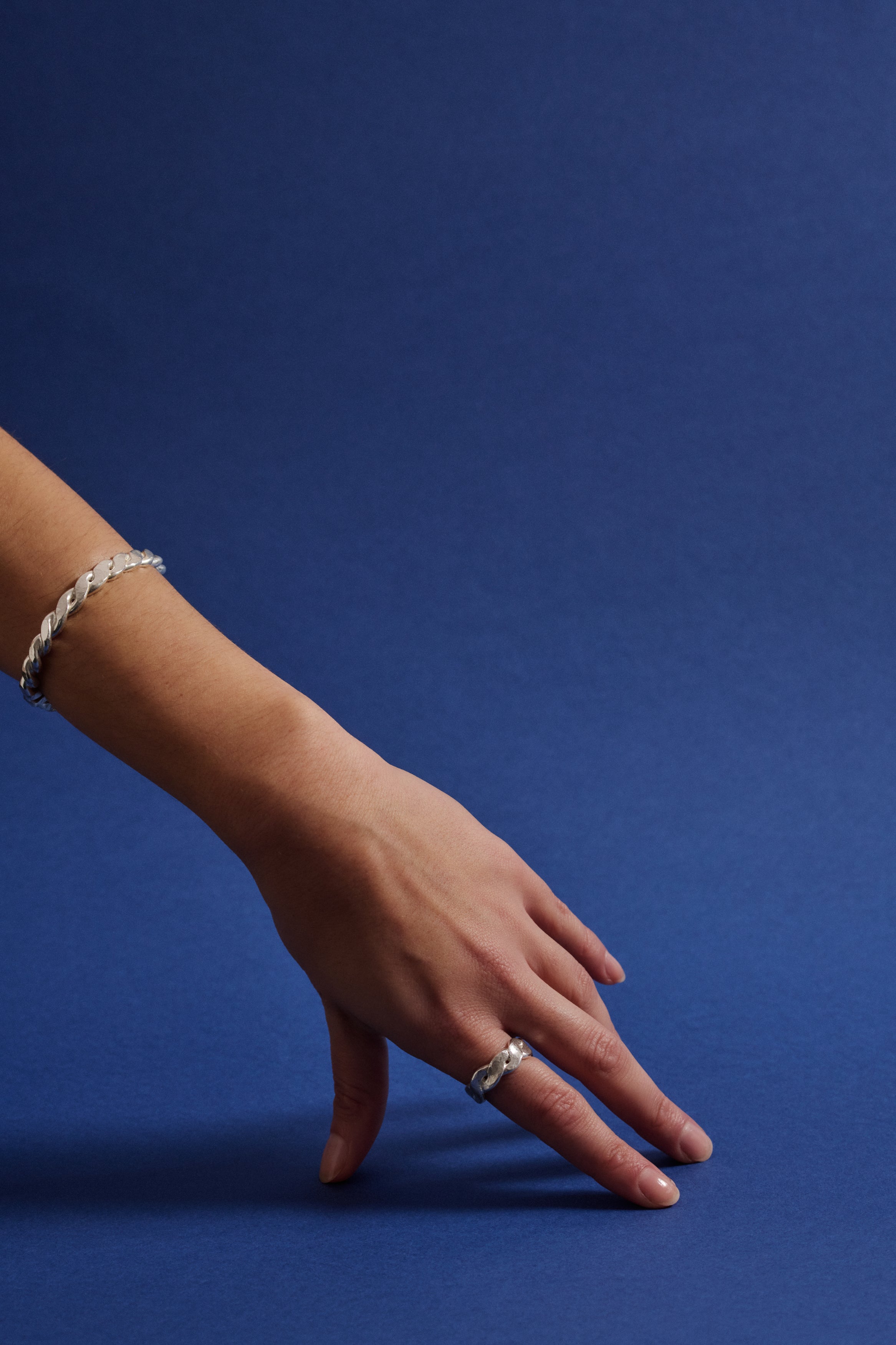 twisted-solid-sterling-recycled-silver-bangle-handmade-london