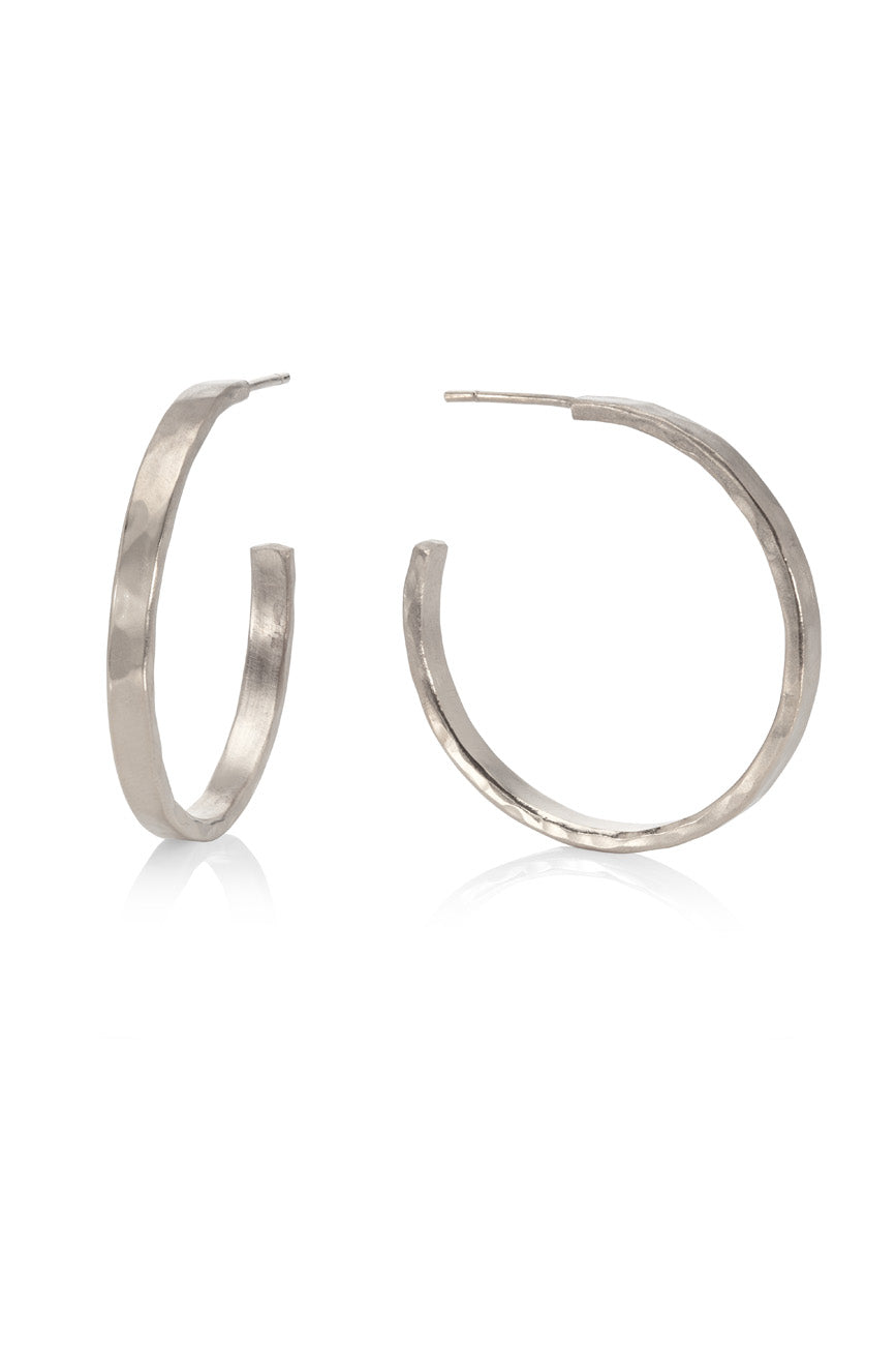 Sterling silver hammered hoops by Kitty Joyas